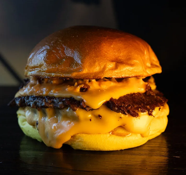 Briox brioche burger bun assembled in a burger